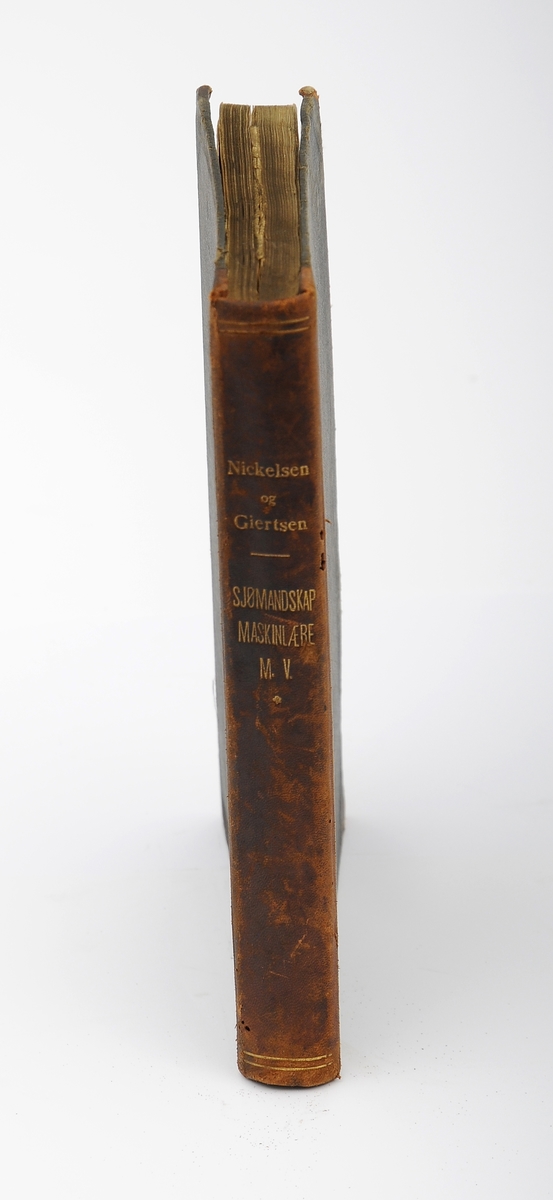 Lærebok i sjømannskap og maskinlære, utgitt i 1912 til bruk ved sjømannskolen.