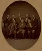 Pensionskommittén 1874. Bakre raden f.v. : T Lidman, M Wennman, G Lybeck, E Hedlund, A Gumaelius. Främre raden f.v.: L V Platen, D Kiellander, G Näsman.