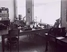 Telegrafverkets utställning vid Göteborgsutställningen 1923. Telegrafbord, fjärrskriftapparat och en automatisk telefonväxel.