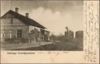 Stationsområde med vy på stationshus och lok.