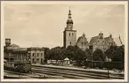 Trefaldighetskyrkan i Kristianstad med järnvägsstationen i förgrunden.