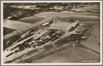 Flygfoto över okänd järnvägsterminal.