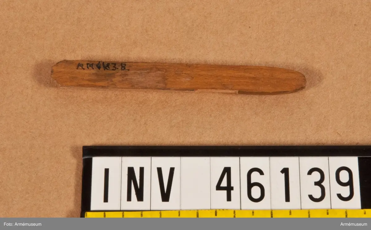 Grupp V.
8 mm genomskuren blind patron till 8 mm gevär m/1867-69.