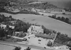 Flygfoto över Gyllene Uttern i Gränna.  Nr R 626.