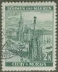 Frimärke ur Gösta Bodmans filatelistiska motivsamling, påbörjad 1950.
Frimärke från Böhmen och Mähren, 1939. Motiv av Stadshus med astronomiskt ur vid torg i Olmütz. 