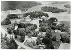Irsta sn, Irsta kyrka.
Flygbild över del av Irsta med kyrkan.