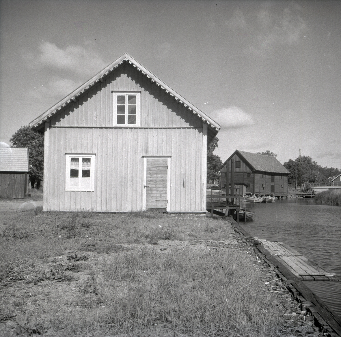 Misterhultsboden i Figeholm, med liggande panel och brygga.