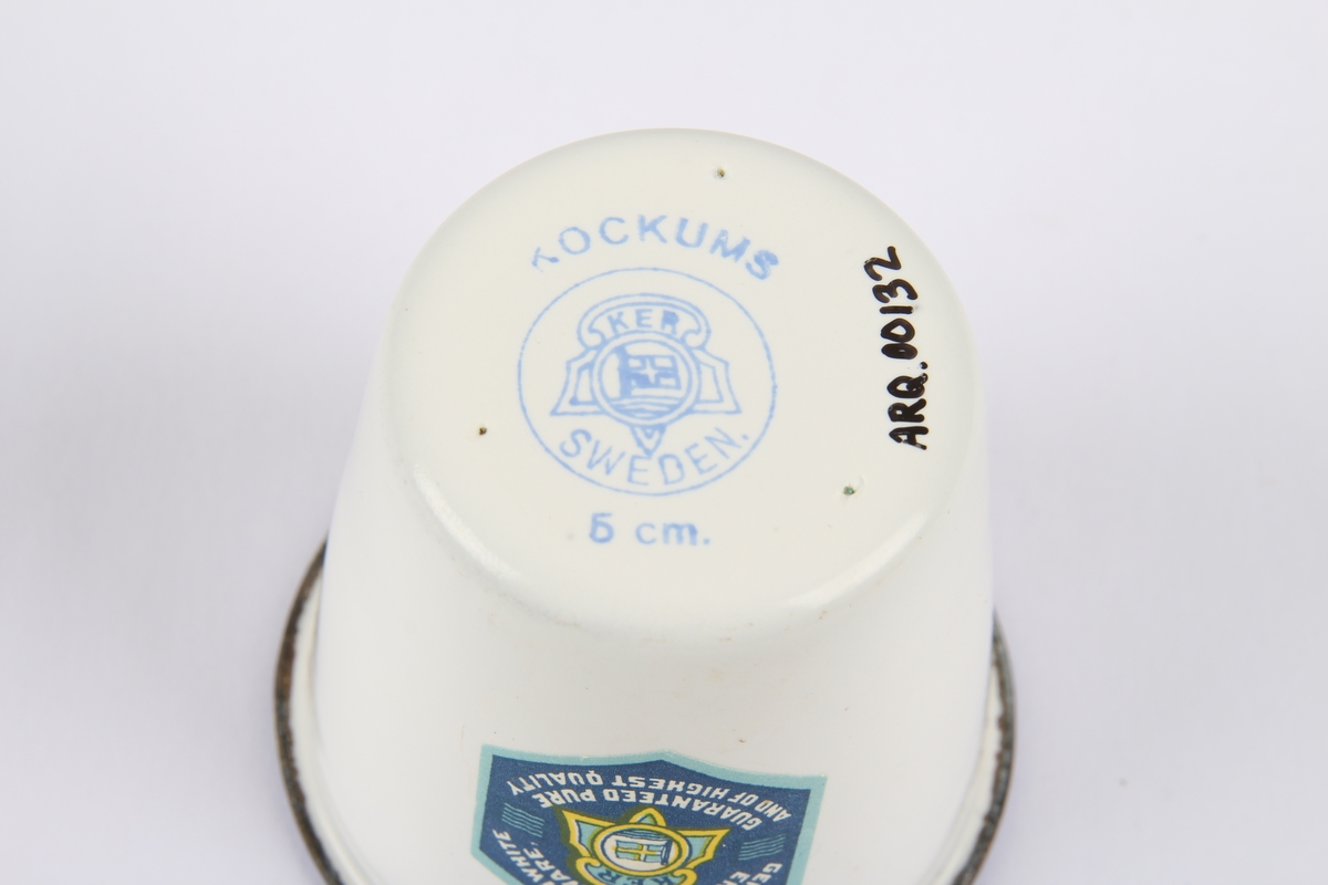 Lite målebeger med ulike mål.