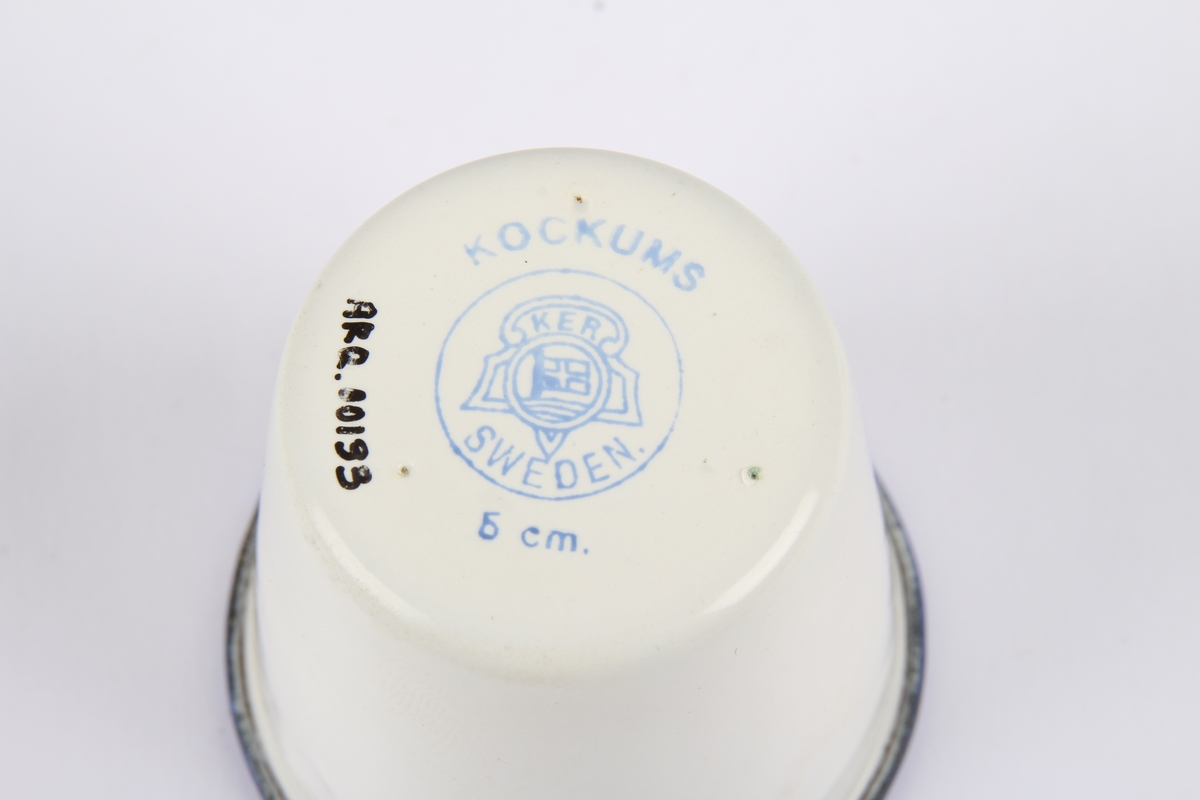 Lite målebeger med ulike mål.