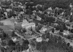 Flygfoto över Tenhult i Jönköpings kommun.  Nr: 1185/1957