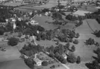 Flygfoto över Nye i Vetlanda kommun, Jönköpings län.  Nr: 1214/1957