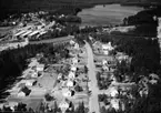 Flygfoto över Hjältevad i Eksjö kommun, Jönköpings län.  Nr: 126/1959