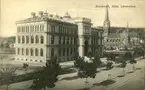 Vykort med motiv över allmänna läroverket och Gustav Adolfs kyrka i Sundsvall.