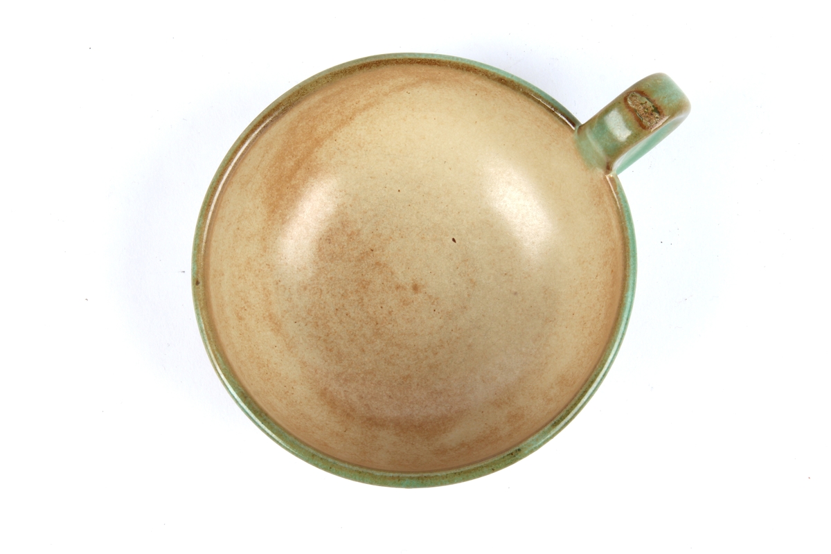 Kaffekopp med dekor.