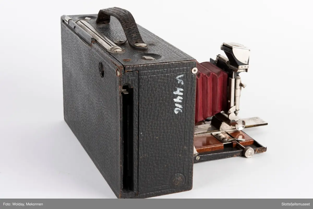 Kombinert apparat for plater og rullefilm