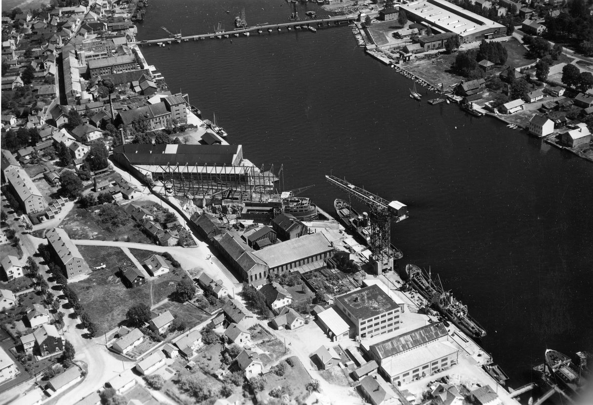 Flyfotoarkiv fra Fjellanger Widerøe AS, fra Porsgrunn Kommune. Porsgrunn Mekaniske Verksted A/S. Fotografert 18.06.1955 Fotograf Vilhelm Skappel