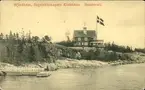 Vykort med motiv över Vindhem, segelsällskapets klubbhus i Sundsvall. Uppfört 1911.