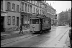 Århus Sporveje, ÅS spårvagn 14 på Knudriisgade mot norr. Spårvägsarbete längre ner på gatan.