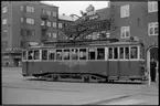 Vid hållplats på Östra Förstadsgatan vid Värnhemstorget står Malmö Stads Spårvägar, MSS EF 14.