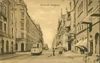 Vykort med motiv över Storgatan och spårvagnstrafiken i Sundsvall.