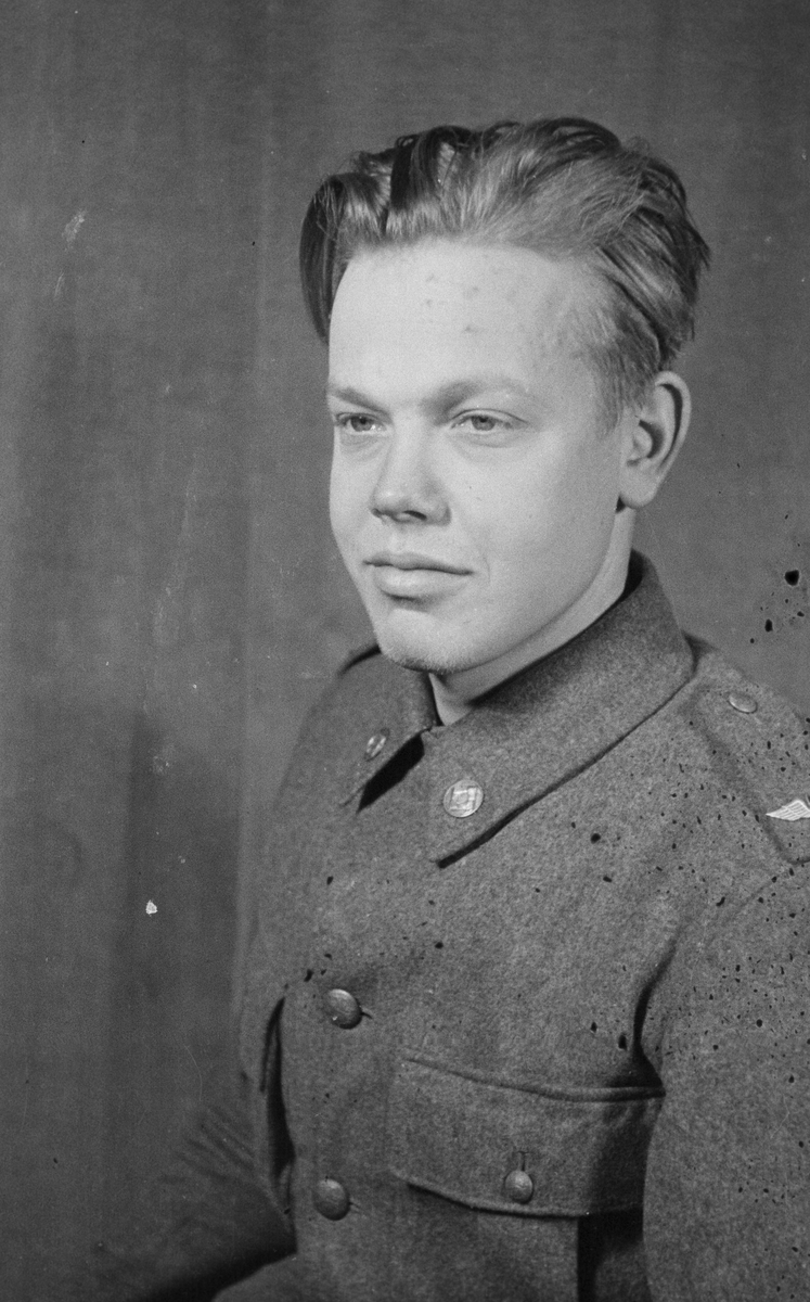 Porträttfoto av oidentifierad soldat vid F 19, Svenska frivilligkåren i Finland under finska vinterkriget, 1940.