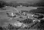 Flygfoto över Södra Hestra kyrka i Gislaveds kommun, Jönköpings län. Nr 1139/1961