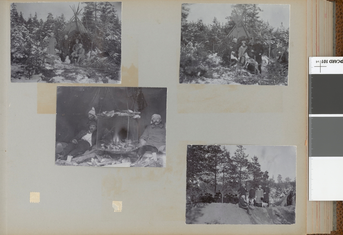 Gruppbild framför tält.