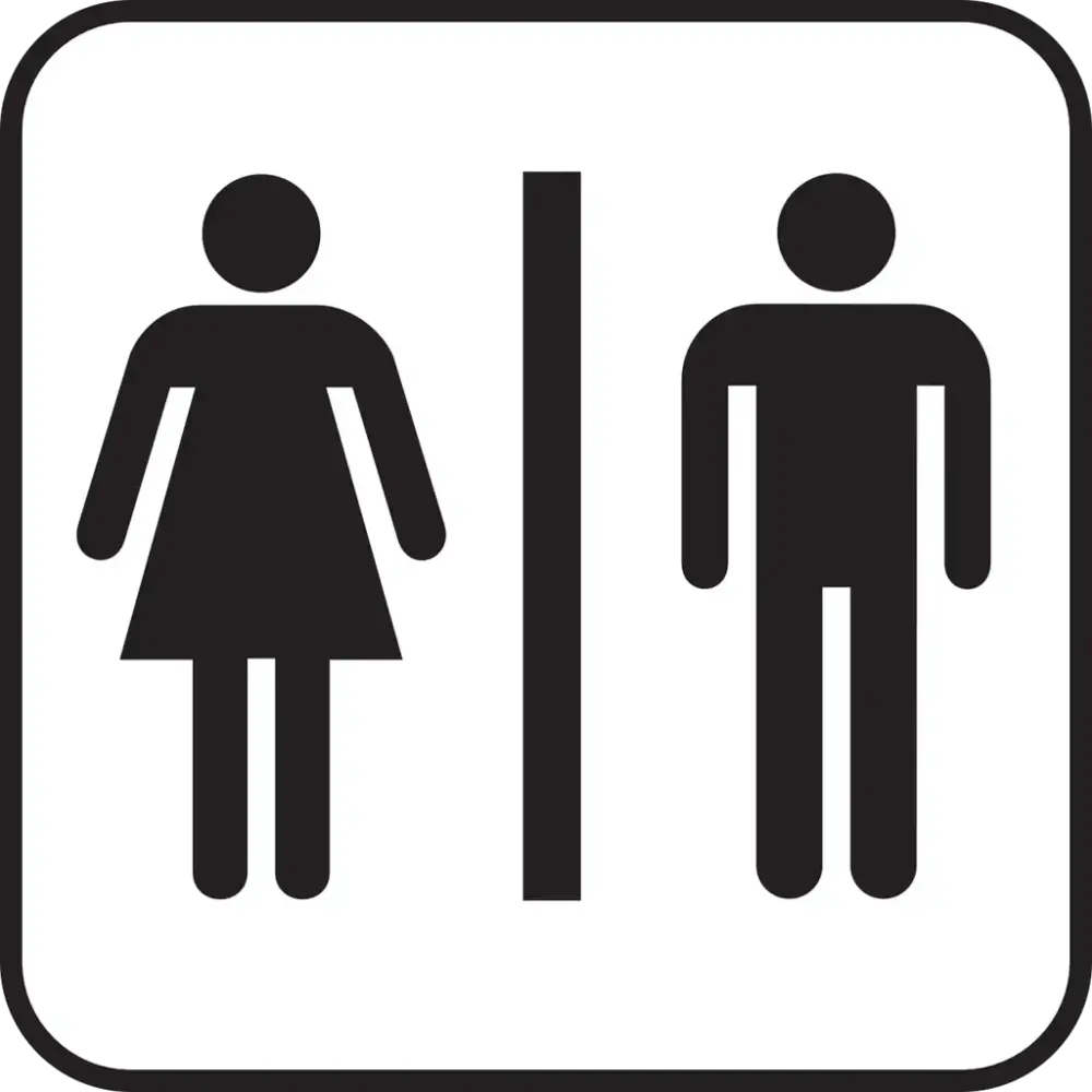 Toalettskilt; hvit bakgrunn og symbol for dame og mann i svart, atskilt med en svart strek