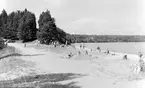 Okänd strand vid okänd sjö, 1950.