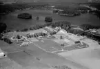 Flygfoto över Långanäs skola i Eksjö kommun, Jönköpings län. 772/1964