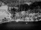 Flygfoto över Romanäsvägen 13 i Tranås kommun,  Jönköpings län. 818/1964