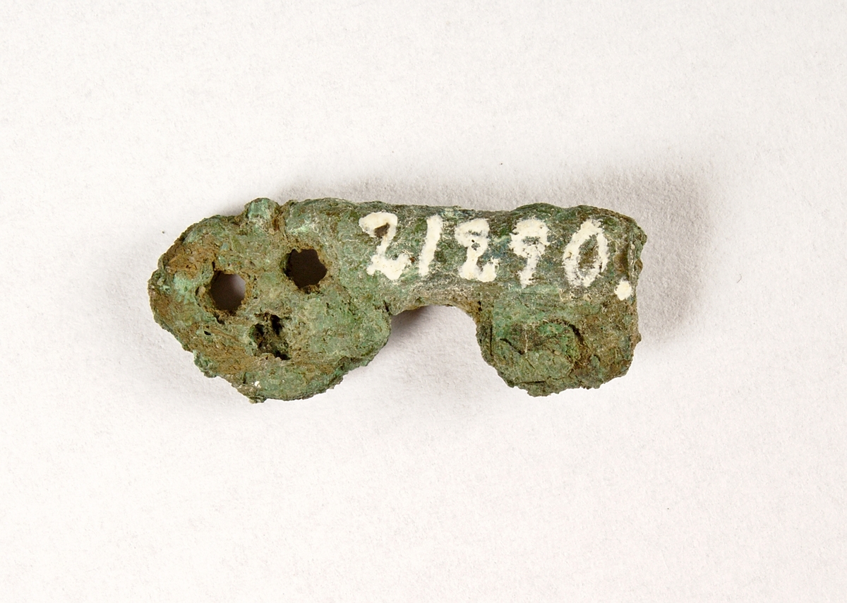 I ena änden tre hål.