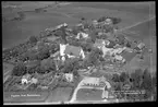 Flygfoto över Romfartuna kyrka