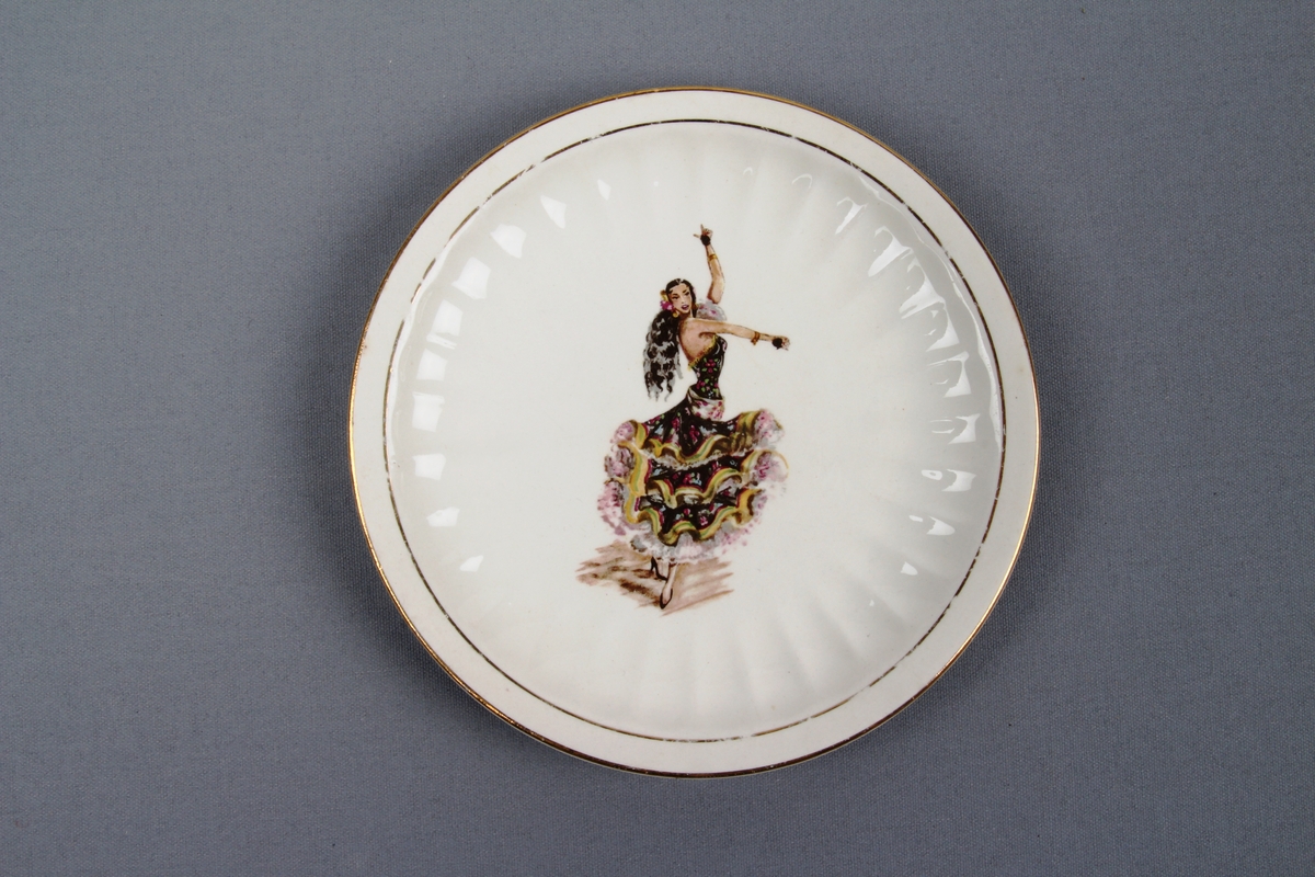 Dansende dame med kastanjetter. Spanskinspirert motiv av en flamencodanser.