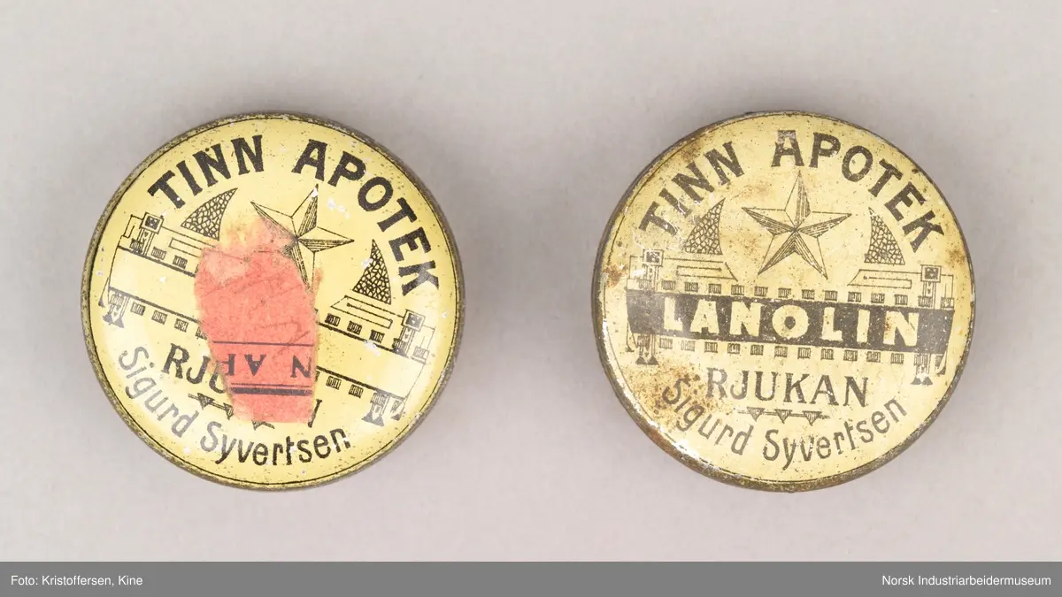 To metallbokser med lanolin. Begge er brukt. Den ene ser nyere ut enn den andre. 