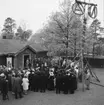 Festlighet vid Laxbrostuga, Skansen. Troligen allmogebröllop.