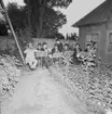 Blåsorkester vid lusthsuet på Boktryckargården, Skansen.