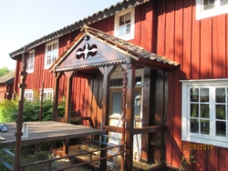 Byggnadsvårdsåtgärder på veranda, på mangårdsbyggnaden på he