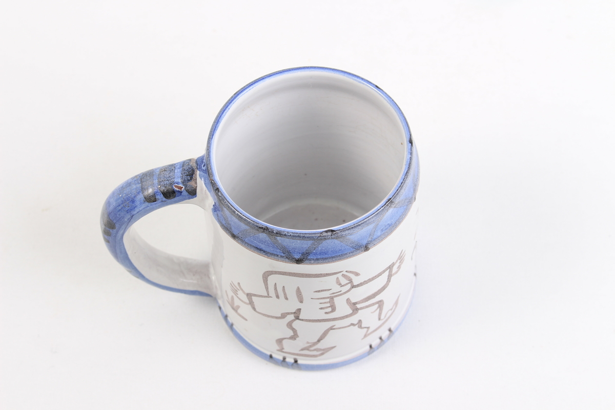 Motiv av 2 personer og en blomst.