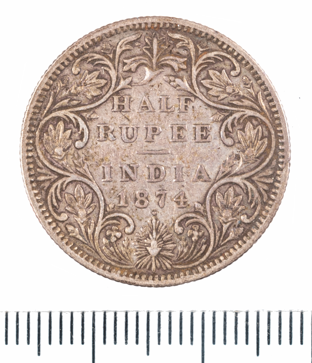Mynt Indien 1874, ½ Rupee.