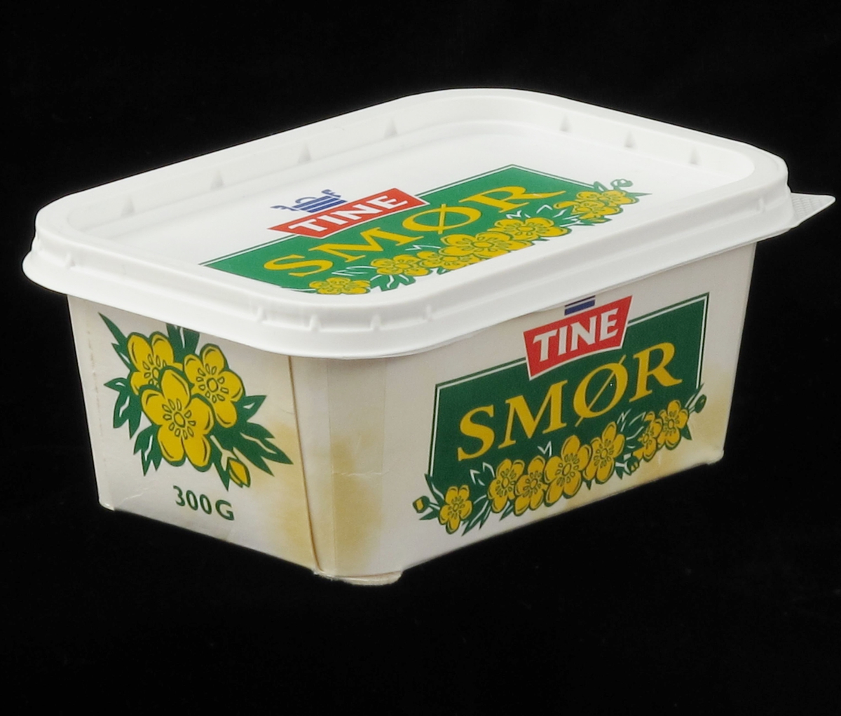 Gule smørblomster mot grønn bakgrunn