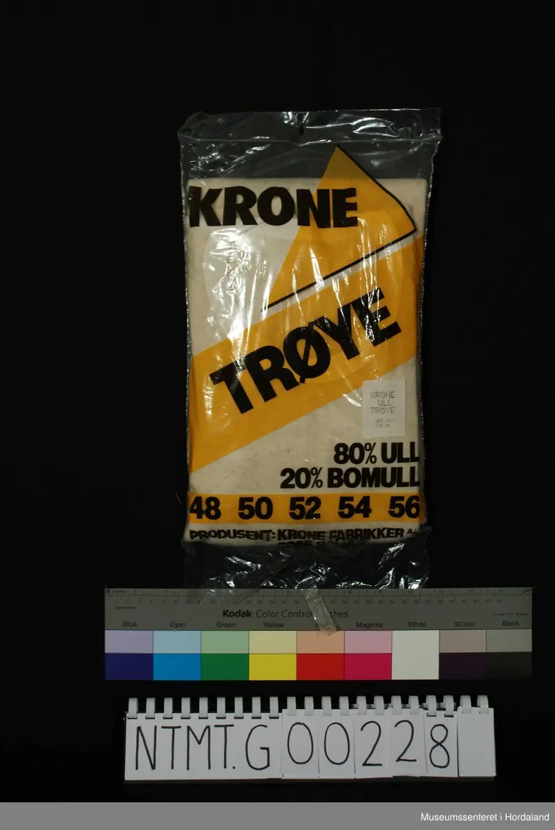 Lange ermer med brotavslutning, rund hals