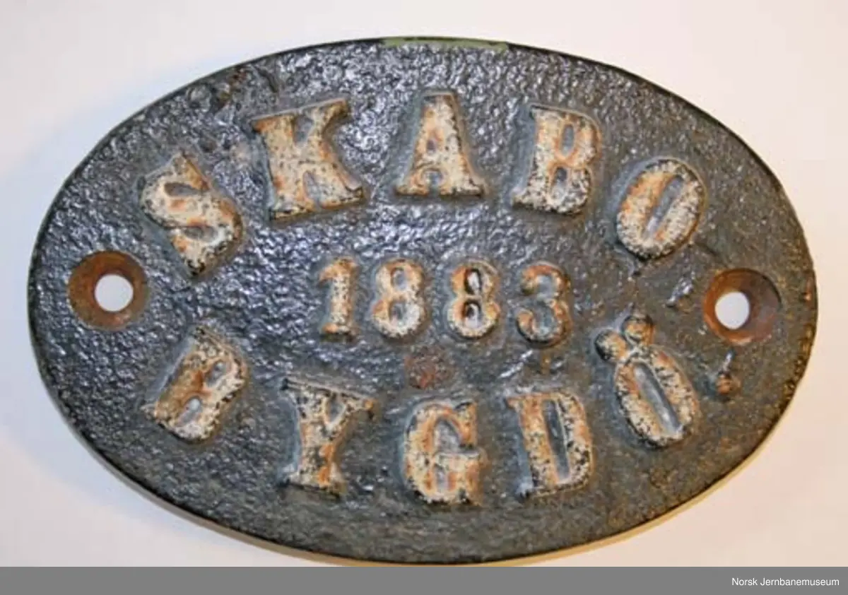 Fabrikkskilt fra Skabo jernbanevognfabrik