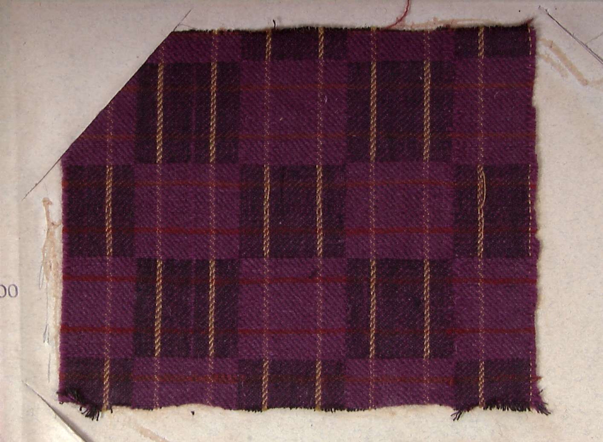 Bok med prøver på møbelstoff