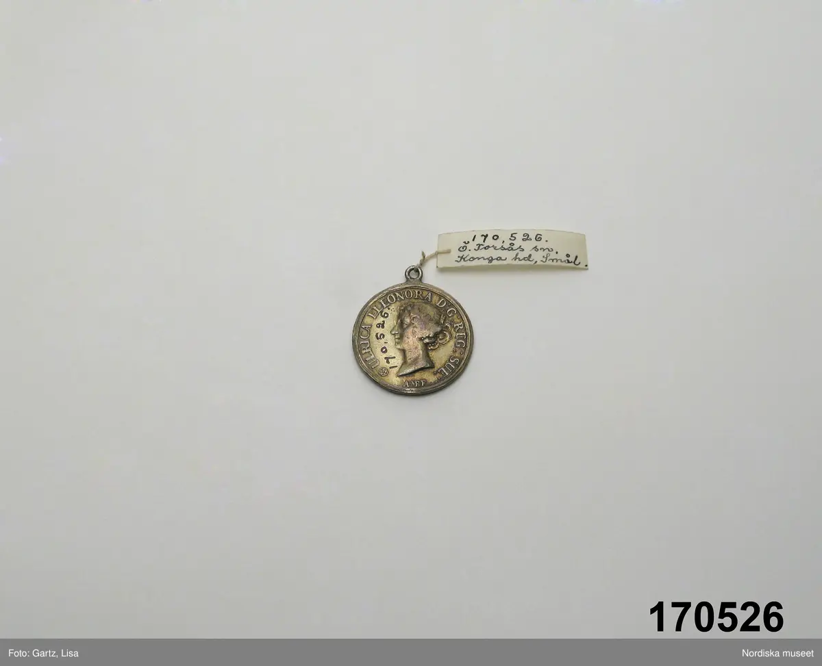 Huvudliggaren:
"Medalj använd som hängsmycke eller del därav, Ulrica Eleonora 1680."