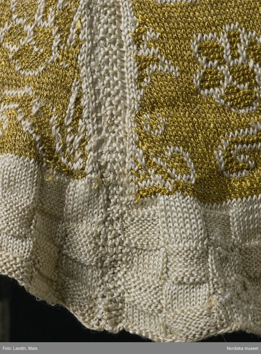 Tröja av gult silke. Silketröja. 1600-tal. 
NM  inv.nr 221941