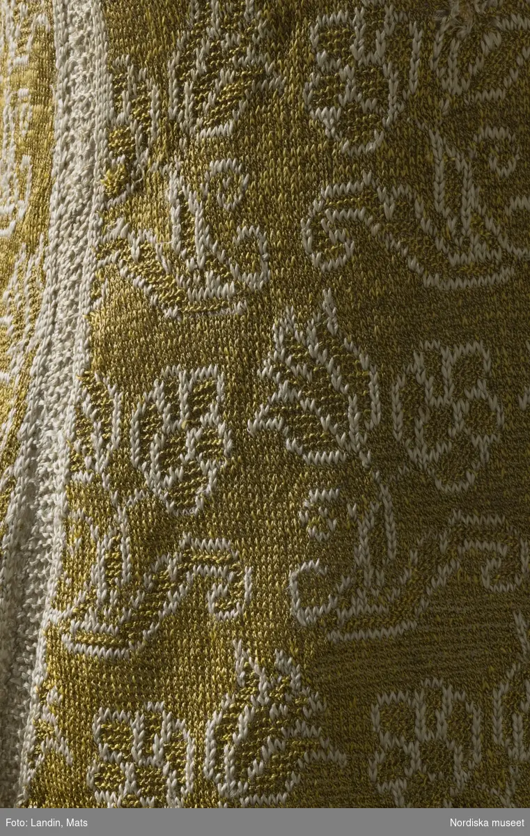 Tröja av gult silke. Silketröja. 1600-tal. 
NM  inv.nr 221941