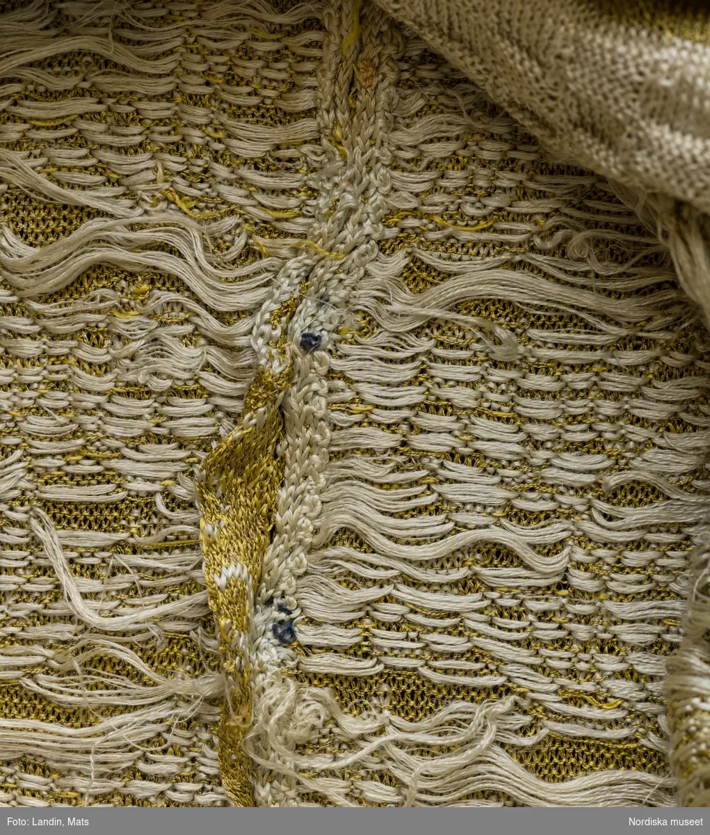 Tröja av gult silke. Silketröja. 1600-tal. 
NM  inv.nr 221941