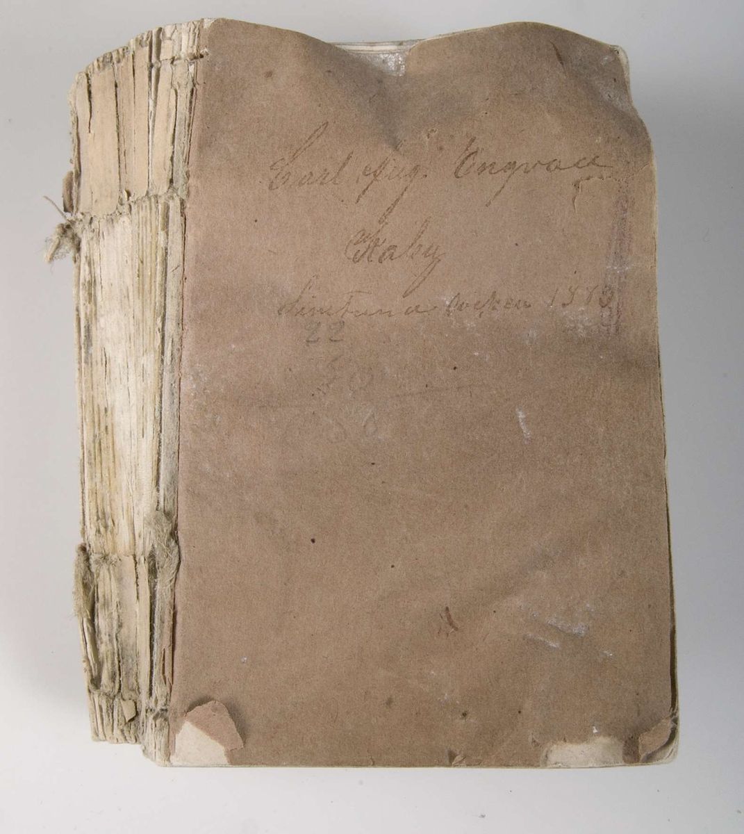 Psalmbok, "Swenska Psalm-Boken af Konungen gillad och stadfästad år 1819", tryckt i Stockholm år 1873. Handskriven text på försättsbladet: "Carl Aug, Engvall, Kaby, Simtuna socken 1880".

