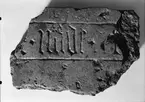 Fragment av en gravhäll, Uppsala 1946